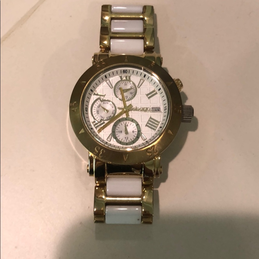 White and gold watch
